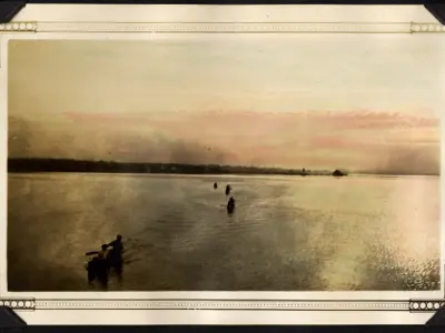 Canoes on the Bay of Quinte at dawn.