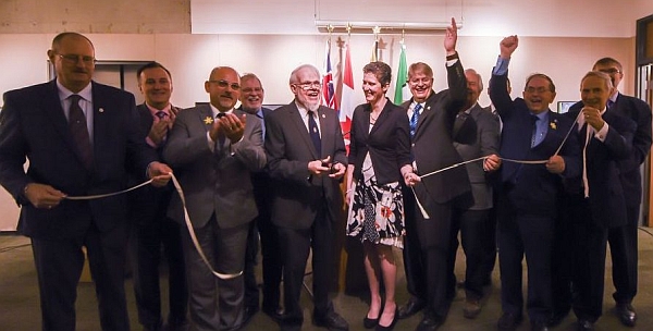 Cutting the ribbon (archival tape).