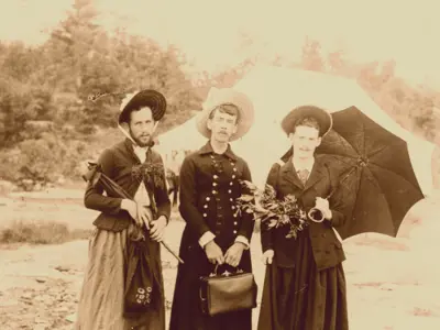 Three men in dresses.